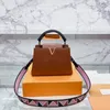färgglada designer väskor