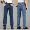Осень зимние джинсы мужчины 100% хлопок высокое качество свободные прямые джинсовые брюки бизнес классические комбинезоны брюки большого размера 40 42 21111