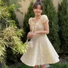 V-образным вырезом Vingate MIDI платье женщины повседневная короткая рукава элегантные цветочные десны дизайн лук платье корея офис леди лето 210521