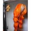 Syntetiska peruker Orange färgad kroppsvåg Gluelös transparent spetsfront peruk med föregångad babyhår dagligen värmematerialtemperatur