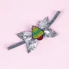 Weihnachten Kinder leuchtend rosa Schmetterling Haarband Kreuz Grenze Baby Pailletten Weihnachten Element Stirnband Babys Mädchen Haar-Accessoires