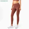 SHINBENE 24 "nu solide entraînement entraînement Compression Leggings Yoga pantalon femmes poche arrière Squat Proof Gym Sport Fitness collants H1221