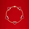 La cadena clásica de pulsera de trébol de cuatro hojas de oro de 18 quilates para mujer está de moda y está en una caja de regalo de alta calidad 0015255689