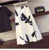 エレガントな2ピースセット女性半袖VネックコットンブラックTシャツ+インク塗装シフォンロングスカートセット夏の女性衣装210514