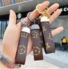 2022 New Arrival Car Keychain Favor Flower Bag Purse Pendant Brown Black Keyring Men Gift Fashion PU Leather Key Chain Mens Accessories