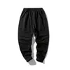 2021 Mężczyźni Hip Hop Spodnie dresowe Spodnie Boczne Przyciski Męska Elastyczna Talia Luźne Joggers Spodnie Y0927