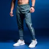 Pantalones de jogging para hombres GYM Ropa deportiva Pantalones deportivos Pantalones deportivos para correr para hombres Pantalones deportivos para correr con bolsillos 4