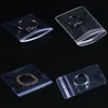 Sacos transparentes de jóias de PVC Limpar altas transmitenciamento de transmissão fecho de fechamento do pendente de pingente pulseira pulseira 100 pcs / lote saco de vedação