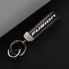 Keychains Highgrade Lederauto Schlüsselbund 360 Grad rotierender Hufeisenschlüsselringe für Ford Fusion Accessoires2779617