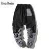 Una Reta Uomo Pantaloni Moda Streetwear Cuciture Colore Pantaloni Hip Hop Lungo Uomo Elastico in vita Cargo 210715