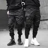 Pantalones Cargo de Hip Hop para hombre, pantalones de chándal Harajuku con múltiples bolsillos y cintas negras, ropa de calle para hombre, pantalones bombachos para correr, pantalones informales 210603
