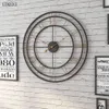 Horloges et montres en fer forgé créatif européen maison salon canapé fond métal rond horloge murale 210414