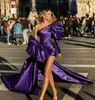 2021 Abiti da sera corti viola sexy con gonna staccabile con strascico Abiti da ballo con una spalla Abito da spettacolo con fiocco sfarzoso per ragazze Abito da cocktail a maniche lunghe