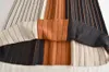 無料のハイウエストの縞模様のニットスカート女性弾性エレガントなAラインミディ秋210524