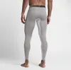 Męskie spodnie fitness szybkoschnące spodnie do biegania kompresyjne GYM Joggers obcisłe spodnie sportowe rajstopy Pro Combat Basketball Pant