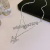 Trendigt dubbel lager glänsande fjäril halsband silver färg kvinnlig flicka hänge clavicle chain halsband bröllopsfest smycken gåva