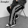 Cal￧a listrada de zongke cal￧a masculino tamanho chin￪s 5xl coreano cal￧a masculina preto 2022 New Aprovals Y220308