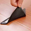 4 stücke Hause Boden Teppich Teppich Matte Greifer Selbst-klebe Anti Slip Tri Aufkleber Wiederverwendbare Waschbar Silikon Grip Auto parfüm Pad