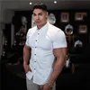 Mode d'été chemise à manches courtes hommes plaine décontracté Super Slim Fit affaires sociales chemises habillées Fitness hommes vêtements de sport hommes