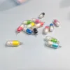 Simpatici ciondoli in resina per capsule con viso sorridente per la creazione di gioielli, orecchini fai-da-te galleggianti, accessori per portachiavi