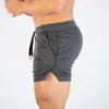 Heren bodybuilding fitness gyms shorts man zomer training mannelijke ademend mesh snelle droge jogger strand korte broek sportkleding 210421