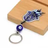 Meibeads 1Pcs Fashion Fatima Main Main Evil Eye Keychains Porte-mouton Sac à main Boucle Pendentif pour les porte-clés de la voiture Hamsa Titulaire de chaînes de clés Femmes G1019