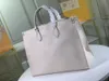 Moda Designer de couro genuíno Onthego Bolsas femininas tote torção messenger Saco de compras bolsos de ombro Sacos de cosméticos navio livre