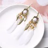 Boucles d'oreilles bohème d'été longues plumes pour femmes, chaîne de plage, pompon, goutte, bijoux de mariée de mariage, cintres Oorbellen