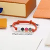 Bracciale di design di marca Classico fiore scozzese in pelle oro Sier fibbia perline corda a mano uomo donna coppia bracciali regalo di moda di alta qualità