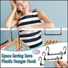 space saving plastic hangers