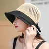 女性のビーチキャップちょう結びの中空ステッチニットワイドブリム帽子スプライスされた漁師の帽子春夏の折りたたみ式サン盆地帽wmq1097