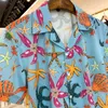 Mäns Casual Shirts 2022 Sommar Fashion Starfish Printed Shirt Trend Brand Party Cardigan Street Lapel Short Sleeve