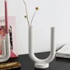 Portacandele a forma di U con tubo bianco Portacandele conico in ceramica moderna con supporto per tubo Vaso per decorazioni per la casa nordica Centrotavola per matrimoni