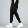 Mannen Multi-Pocket Elastische Taille Design Harem Pant Street Punk Hip Hop Rode Casual Broek Joggers Mannelijke Army Cargo Pants XXXL 211112