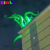 Scultura d'arte Tentacoli di polpo gonfiabili verdi con luci a led Braccio di polpo gigante Piedi Tetto e decorazione della parete per Halloween