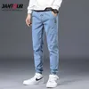 Jeans da uomo primavera autunno Jeans in cotone denim Hip Hop Pantaloni con fondo allentato Streetwear Pantaloni skinny blu Hombre Pantaloni Harem Uomo M-5XL 211008