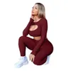 Alla svarta loungewear kvinnor 2 stycken Outfits Front Hollow Out Crop Top Tunika Jogger Leggings Tracksuit Sexig Fitness Wear 210525