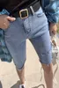 Sommarblå denim shorts streetwear elastiska jeans kvinnor rippade för mager dam knä längd byxor spodenki 10420 210508