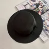 2016 Fashion Sun Hat For Women Classic Panama Cap ozyc Chic Summer Spring Beach Visor Brief Solid Straw Hat Brim Headwear G220301