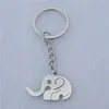 Lång näsa elefant nyckelring söt vild djur proboscis charm safari gåva smycken för kvinnor och tjejer 12 stycken