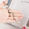 Mulheres pulseiras relógios vintage diamante pérola liga cadeia senhoras relógio de luxo moda aço inoxidável de aço inoxidável banda de cristal relógio de quartzo para presente