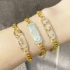 Braccialetti con ciondoli FLOLA Bracciale con catena d'oro Bracciale con luna e stella Rame Zircone Pietra bianca Piccolo cuore per gioielli all'ingrosso da donna Brte41