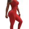 Femmes sport Yoga ensemble siamois taille haute hanches pantalon haut à licou pansement Yoga combinaison Fitness survêtement