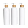 Glänzende weiße Kunststoffflasche, PET-Bambus, Holzkragen, Lotionspumpe, leeres Shampoo, Duschgel, nachfüllbarer kosmetischer Verpackungsbehälter, 500 ml