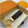 2021 New Keychain Buckle lovers Car Keychain Handmade Leather Keychains Men Women Bag Pendant Accessories and box 886