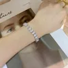 100％925スターリングシルバー5 * 7mmエメラルドカットを作成Moissaniteダイヤモンドの結婚式のバングルブレスレットファインジュエリー卸売