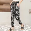 Femmes Pans 2021 Été Automne Casual Pantalon imprimé floral Taille élastique Pantalon crayon mince Pantalon élégant Pantalon Femme Q0801