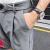 夏のイギリス人の男性のズボンの固体色のビジネスのドレスズボンカジュアルスリムフィットスーツショートパンツサイドスプリット沿いストリートウェア210527