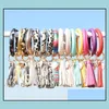 Gynna händelse festliga partileveranser hem trädgårdswomen tofsels armband pu läder wrap nyckel ring leopard lilja print nyckelring armband solros