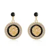 gold basketball earrings